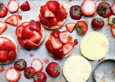 Strawberries on a baking sheet.